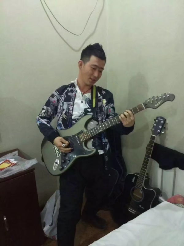 小吉他的第一张照片--中山相亲服务中心